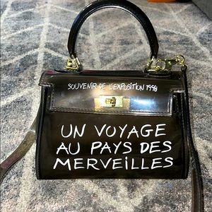 Un Voyage Clear Crossbody Bag